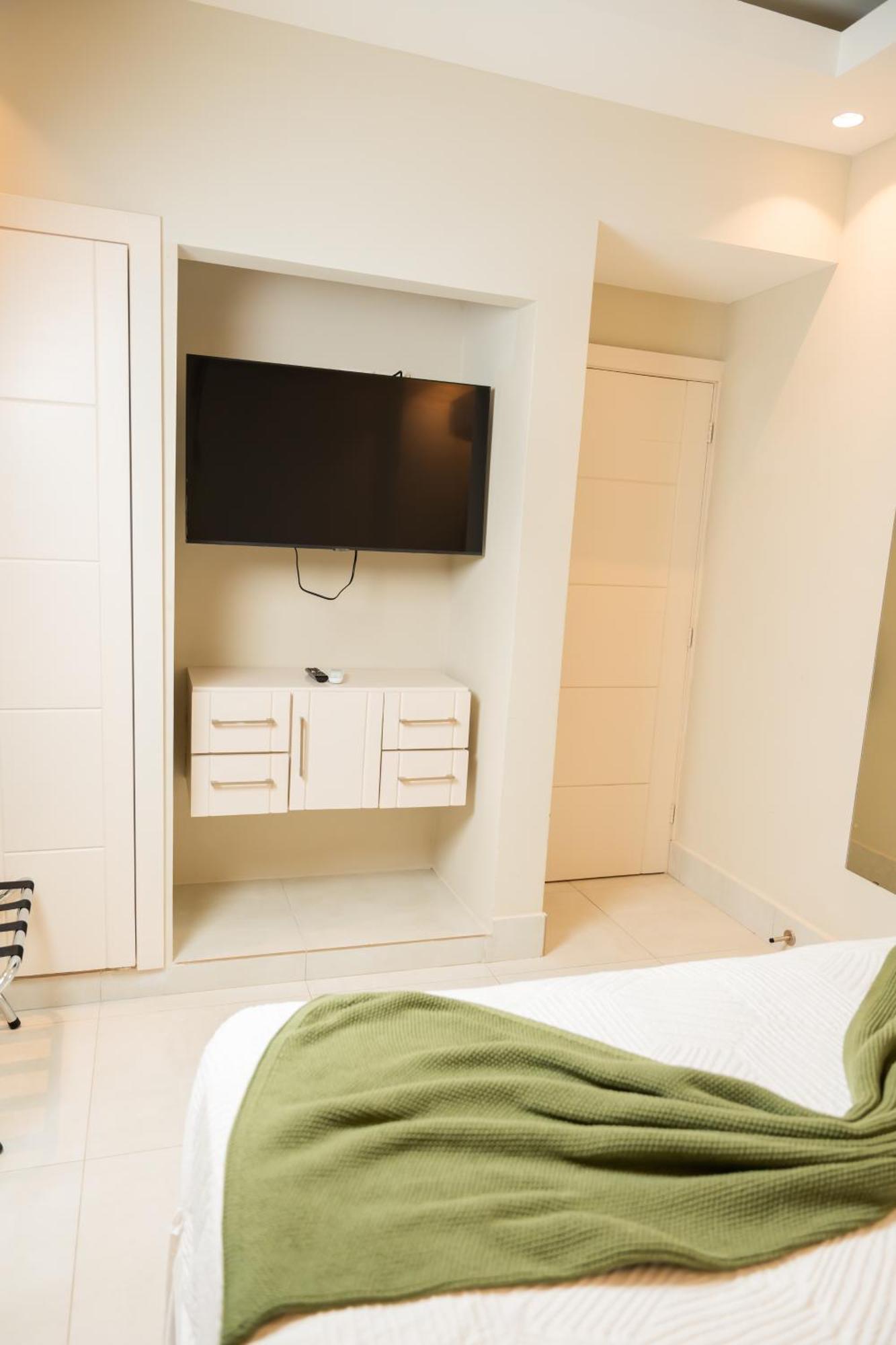 Hotel Stay Here Suites سانتو دومينجو الغرفة الصورة